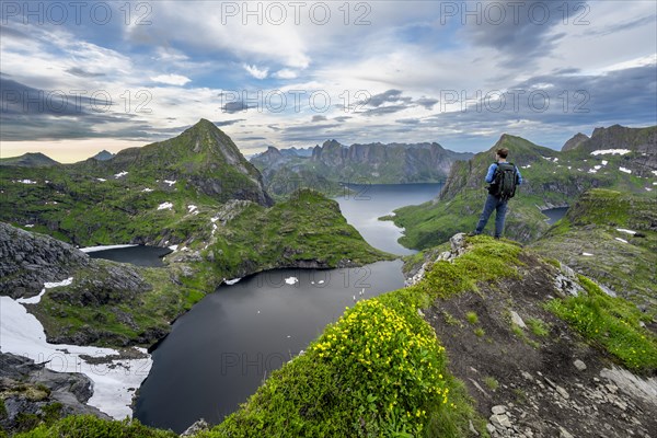 View over mountain landscape and lake Litlforsvatnet with fjord Forsfjorden