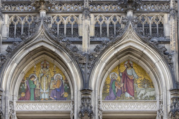 Entrance portal with mosaic at the St Lamberti Catholic Church on Lambertikirchplatz