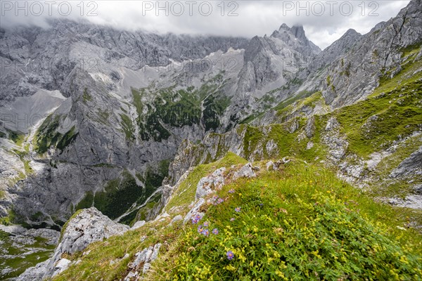 View of cloud-covered rocky mountain landscape with Riffelwand peaks and Riffelkoepfe