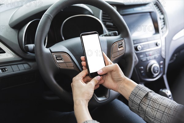 Woman car holding phone mock up