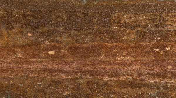 Abstract metallic surface with rust