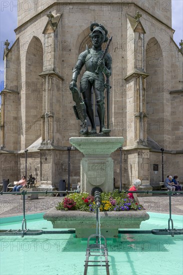 The market fountain in front of the Protestant town church