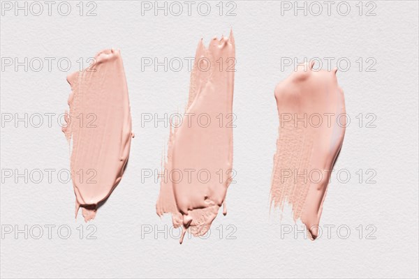 Top view pink paint brush strokes surface