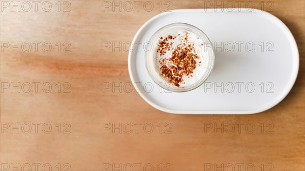 Cocoa powder coffee glass tray brown textured backdrop