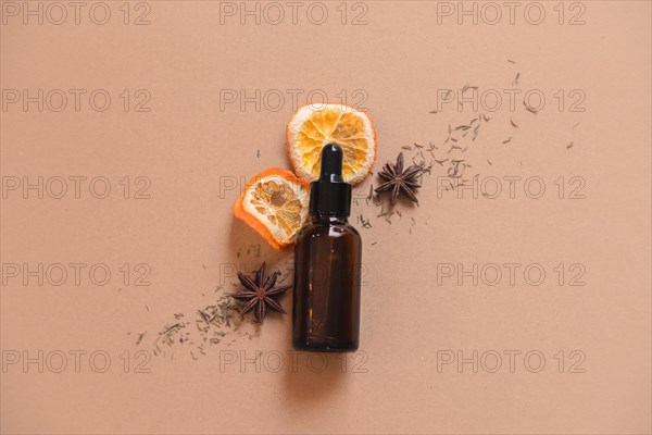 Glass bottle dropper containing organic all natural skincare serum for product mock up