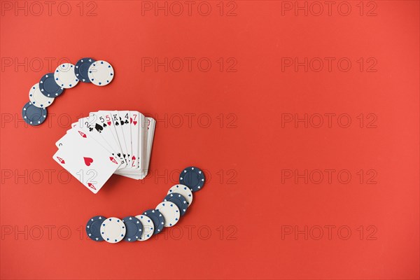 Top view playing cards with poker chips