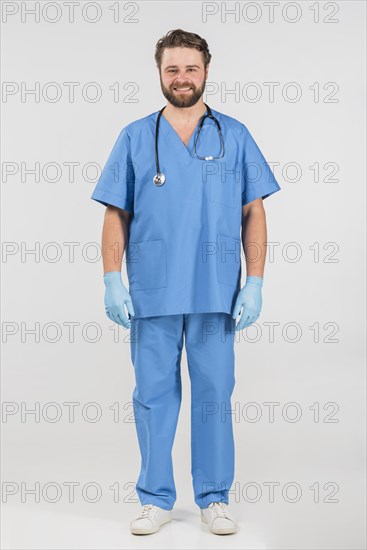 Nurse man standing smiling
