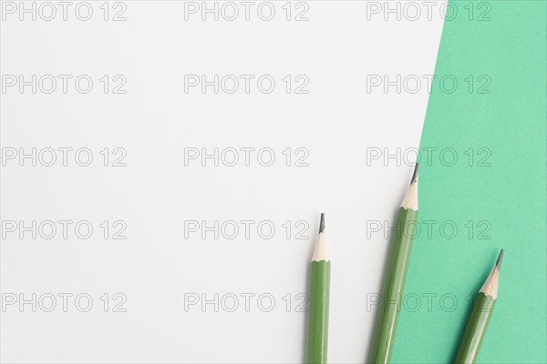 Green sharp pencils dual background