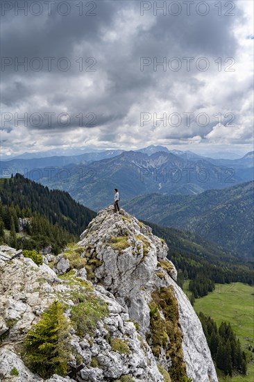 Mountaineer at the summit of Taubenstein