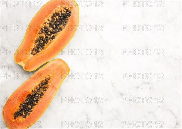 Halves papaya fruit with copy space
