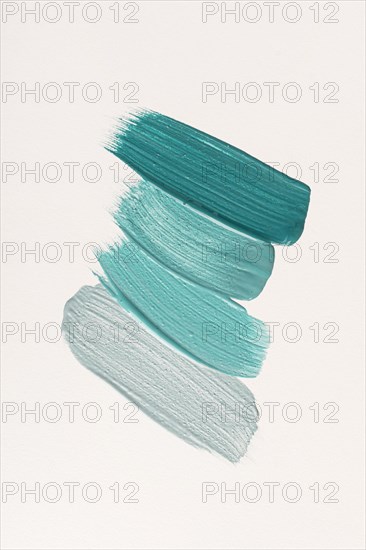 Flat lay blue paint brush strokes