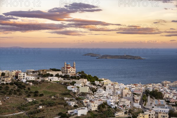 View of the town of Ermoupoli with Anastasi Church or Church of the Resurrection at sunset