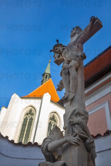 Church of the Sacrifice of the Virgin Mary with statue of Jesus Christ in the historic old town of Ceske Budejovice