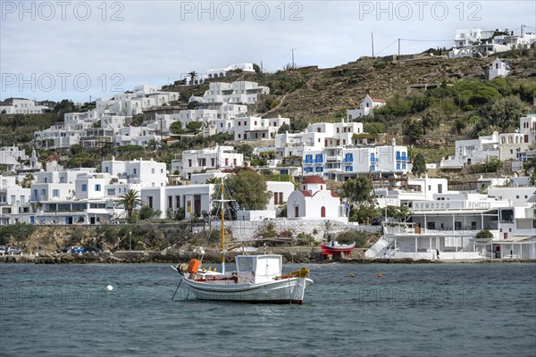 Old port of Mykonos with colourful fishing boat