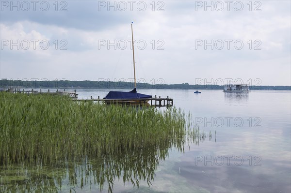 Sailing boat and excursion boat on the Zwischenahner Meer