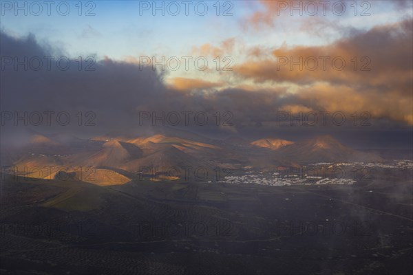 Panorama at sunrise from the Montana de Guardilama to the wine-growing area La Geria