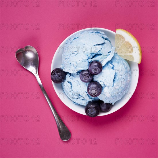 Top view refreshing ice cream with spoon