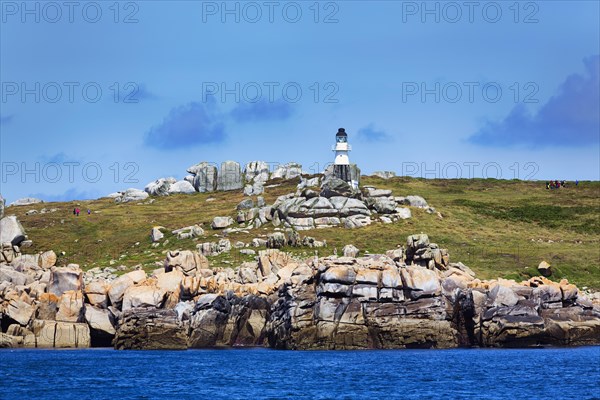 Coastline with granite rocks and Peninnis Lighthouse
