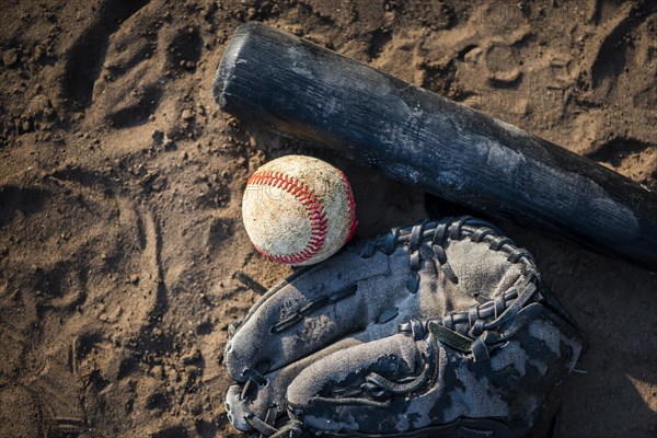 Flat lay baseball bat dirt