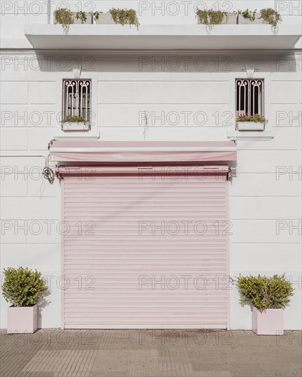 Front view garage door city building