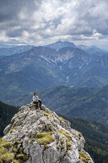 Mountaineer at the summit of Taubenstein