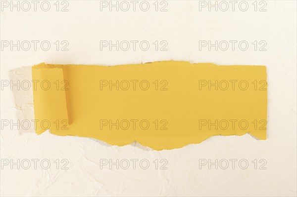 Crooked yellow strip paper pale rose background