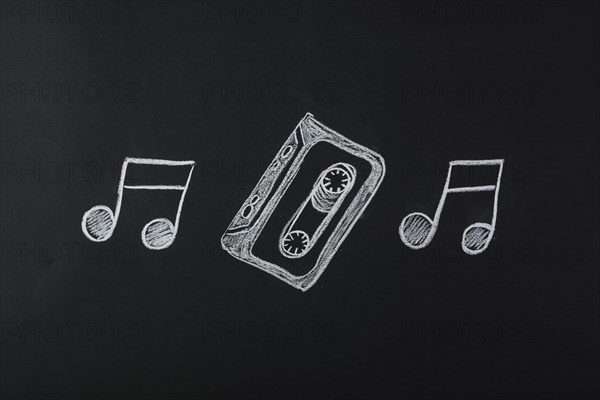 Drawn musical notes with cassette tape blackboard
