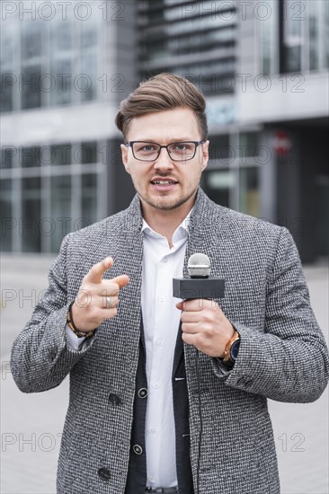 High angle male journalist outdoor