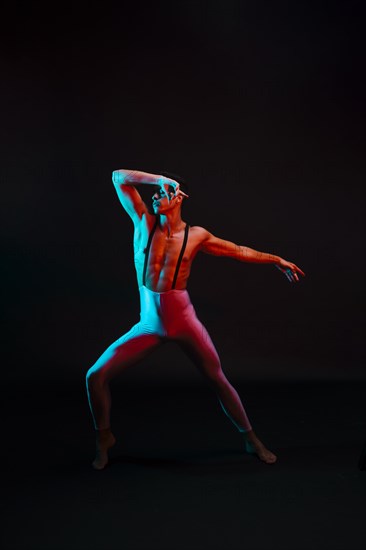 Male ballet dancer leotard with suspenders spotlight