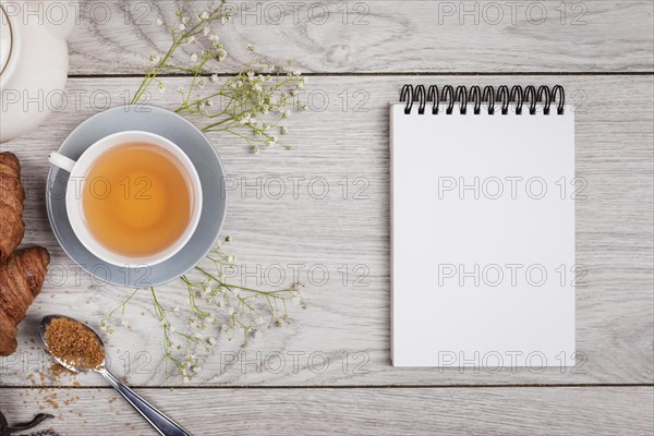 Notebook mock up wooden background