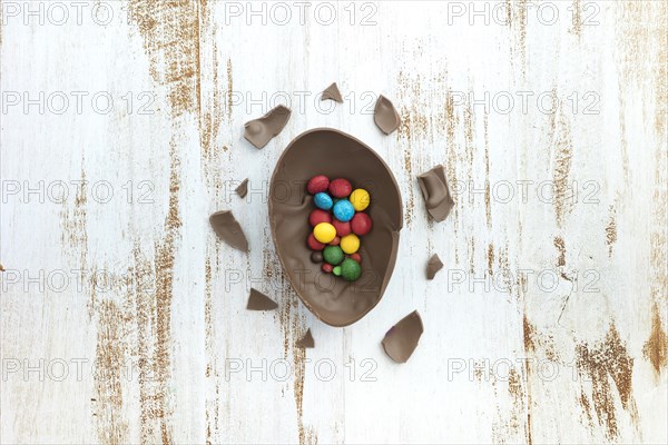 Small candies open chocolate egg table
