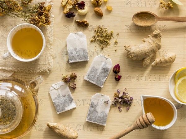 Flat lay natural medicinal herbs with tea