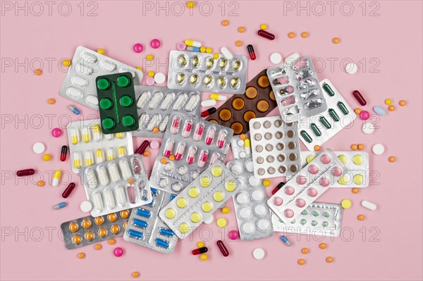 Top view tablets with pills desk