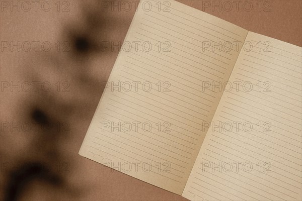 Top view open brown paper notebook