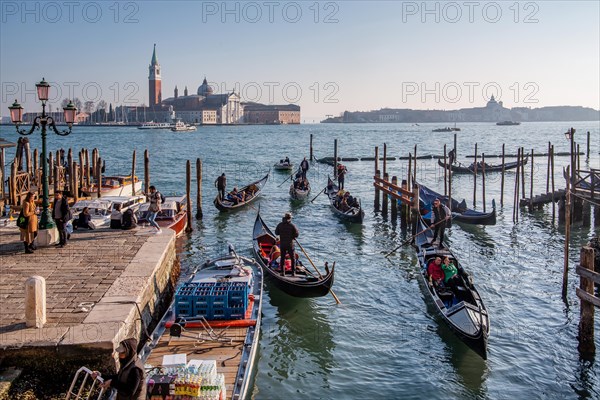 Gondolas on the waterfront with San Giorgio Island