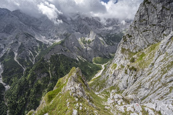 View into the Hoellental on cloudy rocky mountain landscape with Jubilaeumsgrat