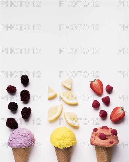 Top view refreshing ice cream cones with copy space