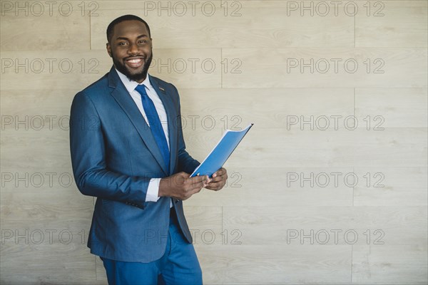 Smiling businessman with cv