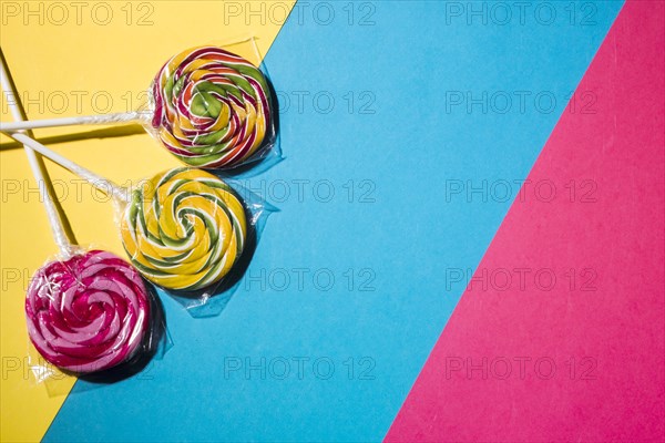 Colorful lollipops candies striped colorful background