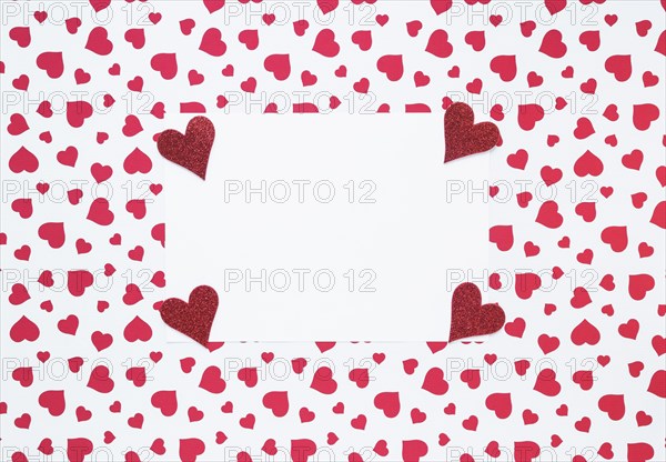 Blank paper with small hearts