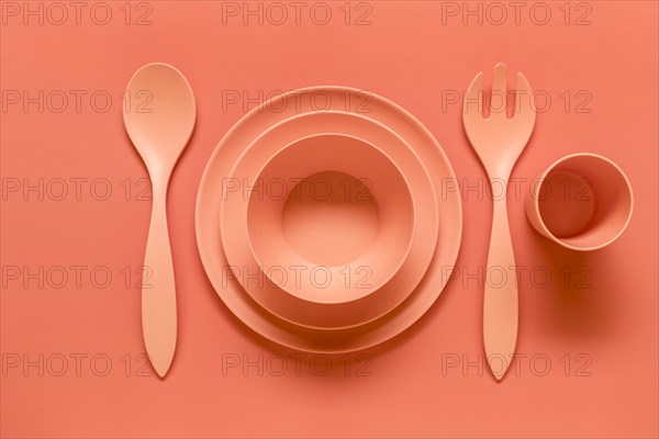 Composition pink plastic served dish
