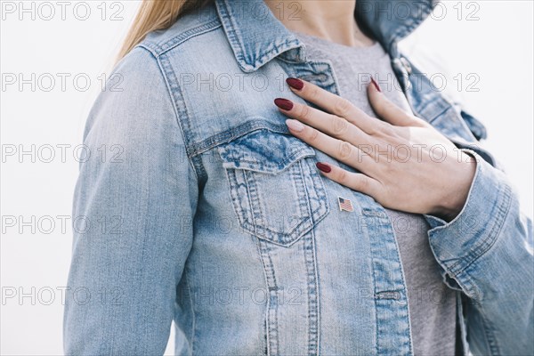 Woman with left hand chest