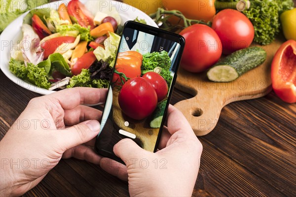 Person taking tomatoes