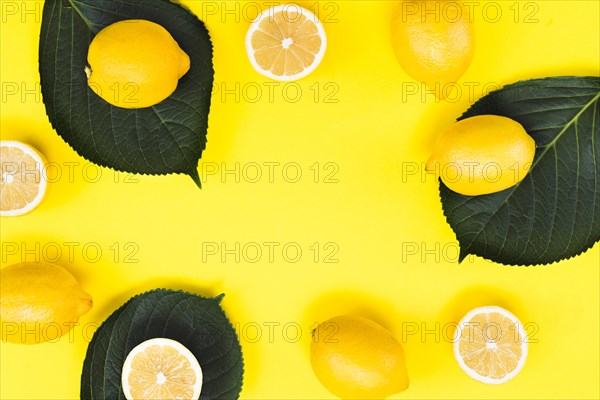 Top view exotic lemons with leaves