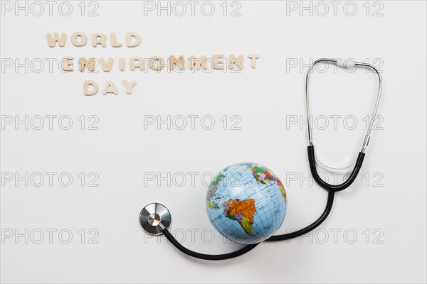 Earth stethoscope text world environment day