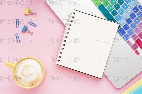 Top view desk with blank notebook