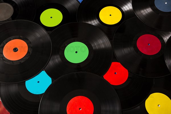 Many colorful black vinyl records
