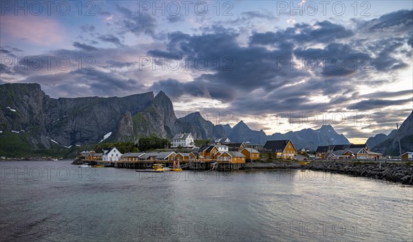 Traditional yellow rorbuer cabins on Sakrisoya Island