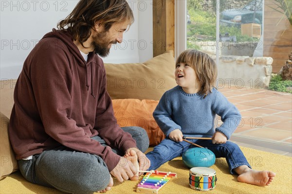 Father son playing together