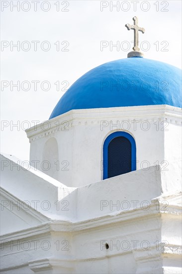 Blue dome of the Cycladic Greek Orthodox Church Holy Church of Agios Nikolaos of Kadena